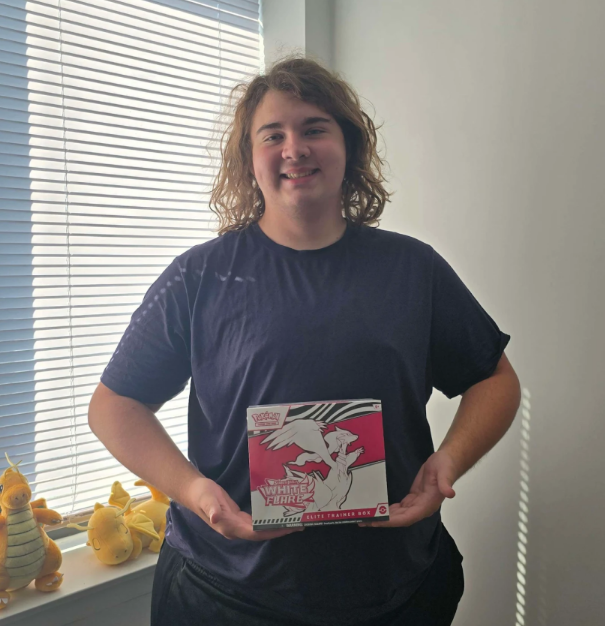 Jacob Johnson holding a White Flare Elite Trainer Box