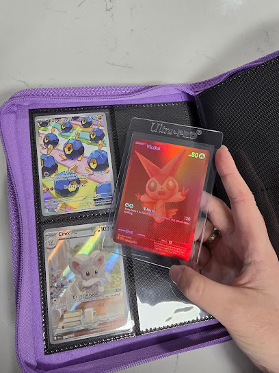Vanessa Reid's pulled red Victini card and binder page